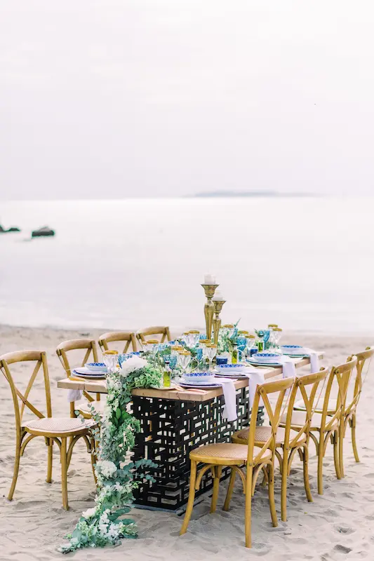 Elegant wedding reception table setup at Reef Athens venue